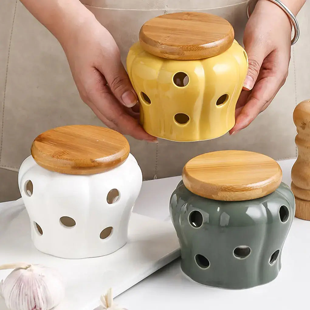 Ventilated ceramic garlic jar with wooden lid for ideal storage.