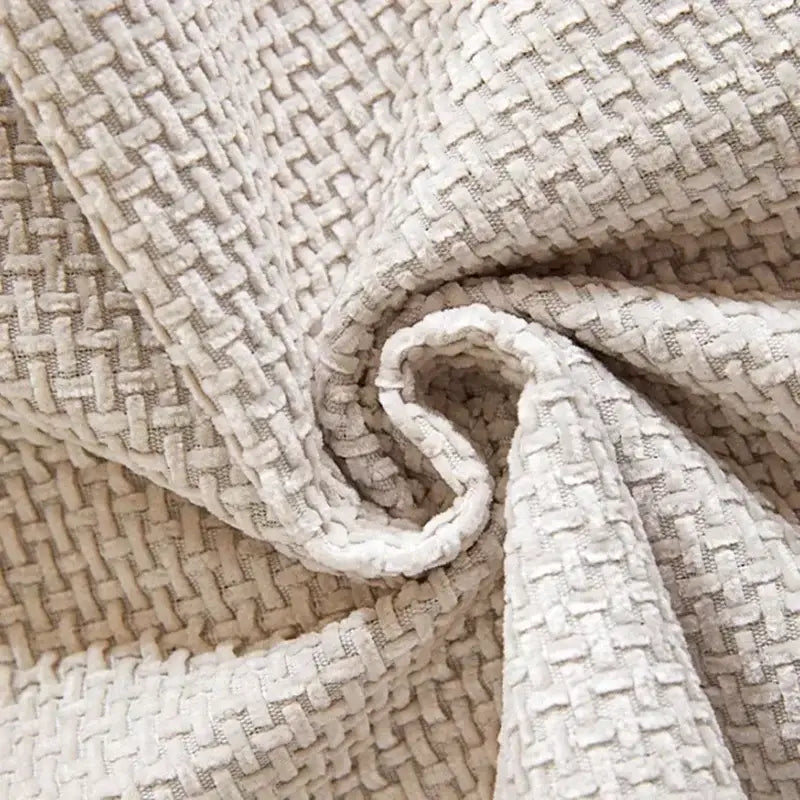 Imagem de tecido texturizado e entrelaçado na cor cinza claro do Sofá Chenille Ricaly