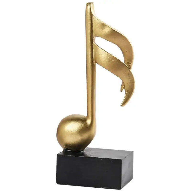 Escultura de notas musicais douradas sobre base preta para decoração Ricaly