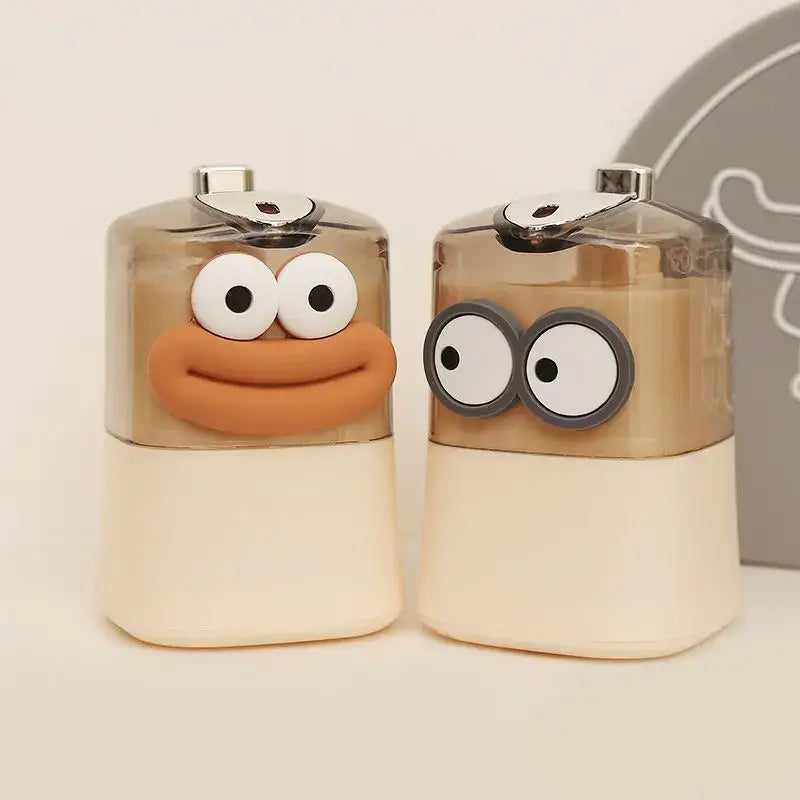 Duas dispensadores de sabonete cartoon em produto Porta Palitos Boca Grande Design Inovador